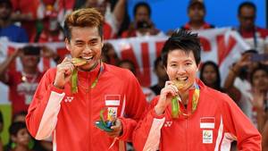 Tontowi Ahmad/Liliyana Natsir (Indonesia) saat merebut medali emas Olimpiade Rio de Janeiro 2016 lalu.